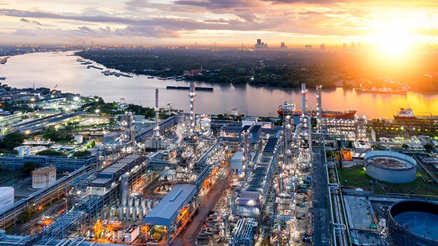 industrial-plant-by-river-in-sunset.jpg